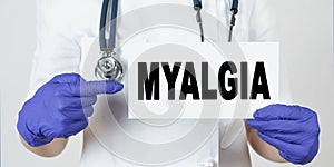 The doctor points his finger at a sign that says - MYALGIA