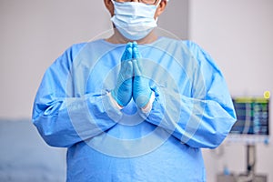 Doctor, praying and hands with healthcare and surgery, seek guidance from God and worship, hope and operation room
