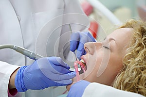 Doctor prepare young patient for dental procedure