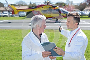 Doctor preparing in helicopter emergency medical service
