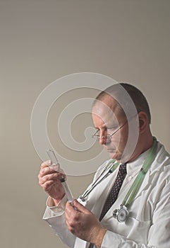 Doctor preparing injection