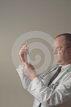 Doctor preparing injection