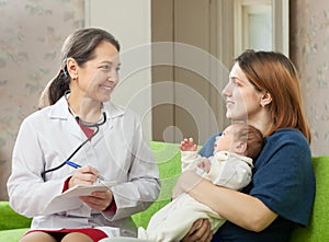 Doctor of prescribes to newborn baby the medication photo