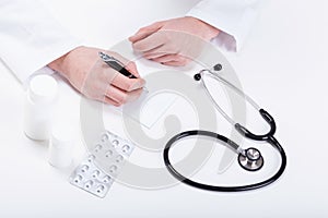 Doctor prescribing medicines to patient