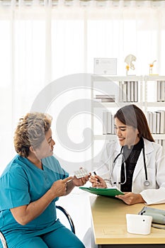 Doctor prescribing pills patient