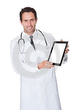 Doctor presenting empty digital tablet