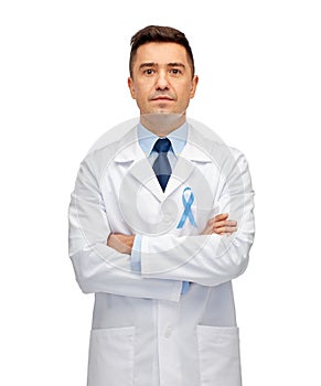 Doctor with prostate cancer awareness ribbon