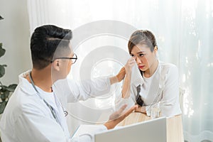 Doctor or psychiatrist consulting and diagnostic examining stressful woman patient on obstetric - gynecological female illness, or