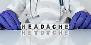 The doctor put together a word from cubes HEADACHE