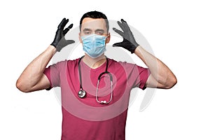 A doctor puts on a protective mask