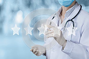 Doctor puts a rating on a virtual screen