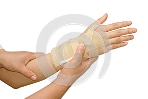 Doctor putting wrist brace