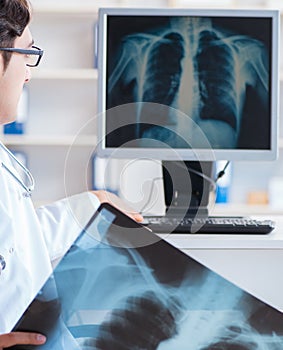 Doctor radiologist looking at x-ray images