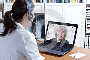 Doctor x-ray laptop patient telehealth