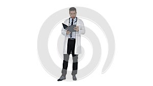 Doctor reading Medical Report of Patient or Recepie or Text book on white background.