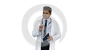 Doctor reading Medical Report of Patient or Recepie or Text book on white background.