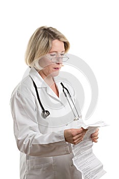 Doctor reading package insert photo