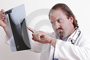 Doctor reading an x-ray