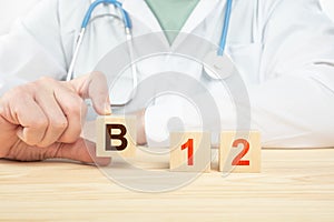 Doctor recommends taking vitamin b12. doctor talks about the benefits of vitamin b12. B12 Vitamin - Health Concept