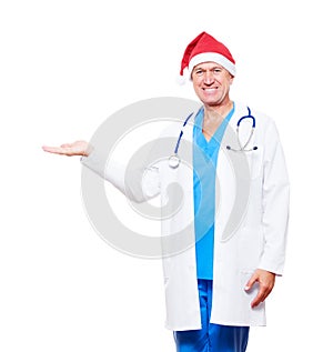 Doctor in red hat holding something on his palm