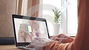 Doctor`s advice on computer app, stethoscope with the Irish flag. Telehealth technology in Ireland