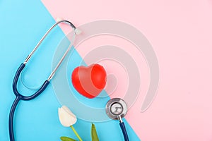 Doctor`s Day concept, flat lay top view, stethoscope with red heart