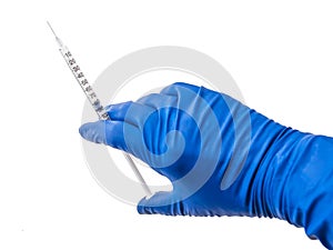 Doctor`s hand in blue medical glove holding open syringe with medical solution isolated white background. Flu vaccine