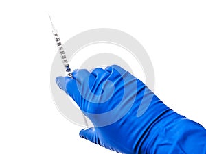 Doctor`s hand in blue medical glove holding open syringe with medical solution isolated white background. Flu vaccine