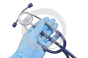 Doctor`s hand in blue medicine glove with stethoscope isolated white background