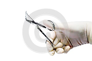 Doctor`s hand  in the medical latex glove holding Medical umbilical cord scissor