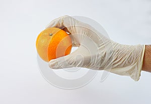 Doctor`s hand wearing gloves vitamin C immunity fighter thumbs up, virus, corona, covid-19, sars. mers, bacteria, germs