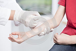 Doctor's hands doing allergy test photo