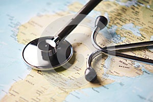 Doctor`s medical stethoscope over africa healthcheck