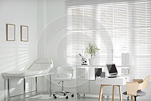 Doctor`s office interior with workplace in clinic