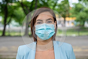 Doctor scientist or nurse protrait - woman with facemask face mask stock photo