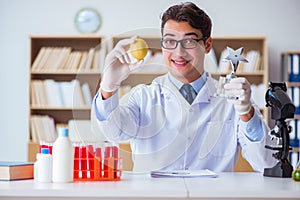 The doctor scientist receiving prize for his research discovery