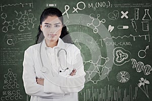 Doctor with scribble on the blackboard