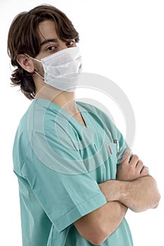 Doctor in scrubs and facemask