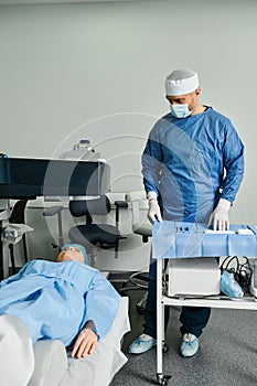 A doctor in scrubs stands attentively