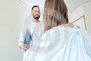 Doctor seeing patient in hospital