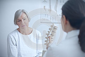 Doctor senior patient backbone model