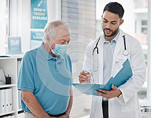 Doctor, senior patient and talking on file in hospital, medical service and support for healthcare. Elderly person, man