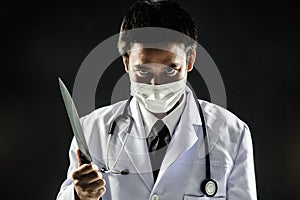 Doctor Serial Killer psychosis hold knife photo