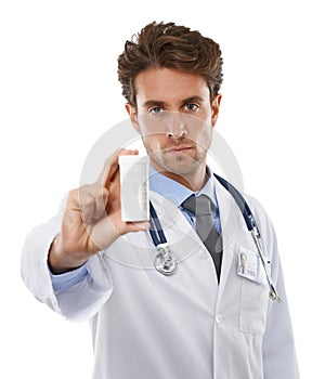 Doctor, serious and portrait in studio with tablet, prescription medication and healthcare with pharmaceuticals