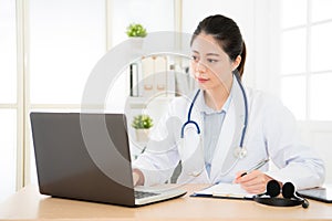 Doctor seriously searching medical records