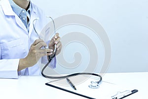 Doctor set stethoscope and prepare to exam the patient