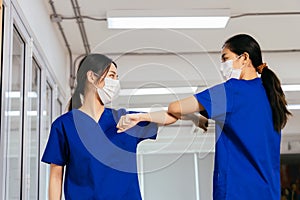 Doctor shaking hand with elbow during covid-19 outbreak