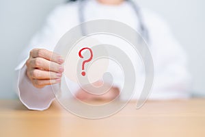 Doctor show Questions Mark on paper. FAQ, frequency asked questions, Answer, Information, Communication, Health, Diagnosis