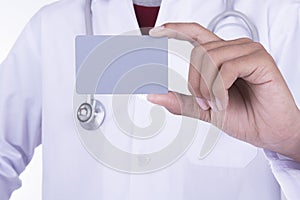 Doctor showing blank namecard on white background