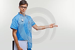 Doctor showing a copy space against white background.